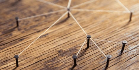 Nails with string connecting them