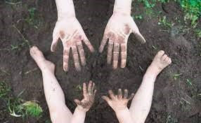 Hands Playing In Dirt